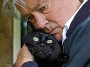 Alain Delon sepolto con il suo gatto a tre zampe: lo aveva congelato dopo la morte