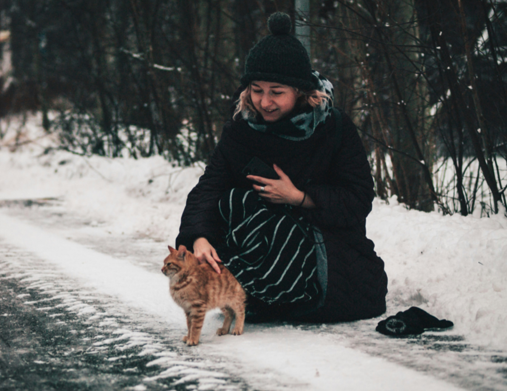 Gatto con una signora